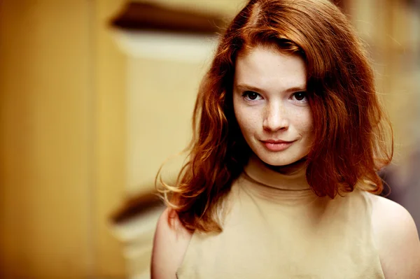 Portrait of a beautiful girl with freckles — Stock Photo, Image