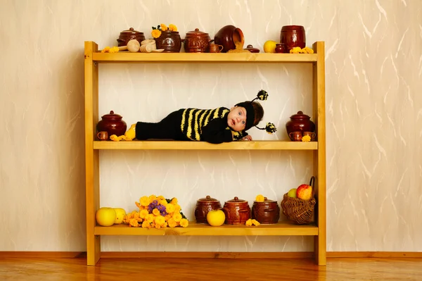 Little funny baby with bee costume — Stock Photo, Image