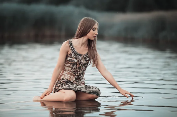 Beautiful girl on water — Stock Photo, Image
