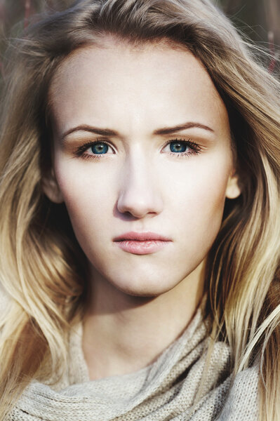 Portrait of beautiful girl on windy day