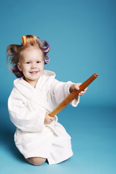 Young happy housewife with rolling pin — Stock Photo, Image