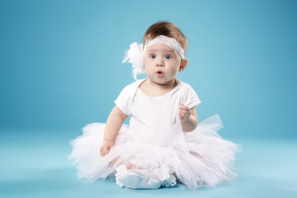 Little ballerina on blue background — Stock Photo, Image