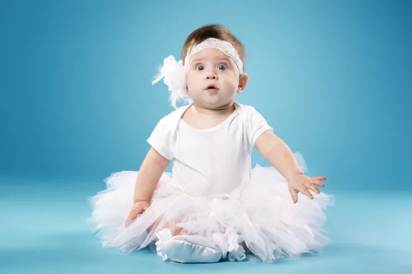 Little ballerina on blue background — Stock Photo, Image