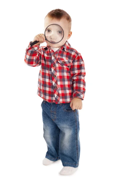 Niño pequeño con lupa — Foto de Stock