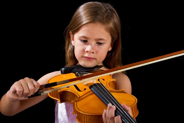 Girl playing violin in pink dress — Stock Photo, Image