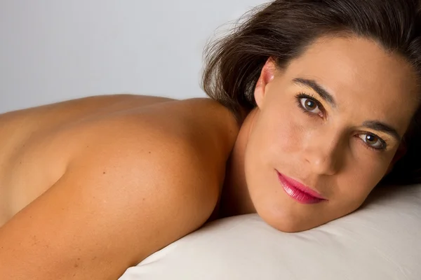 Closeup of woman on bed — Stock Photo, Image