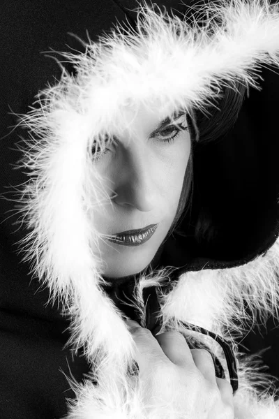 Portrait of sad woman in black cape black and white — Stock Photo, Image