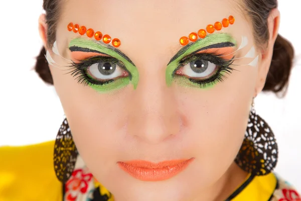 Schöne brünette Frau Porträt mit kreativem Make-up — Stockfoto