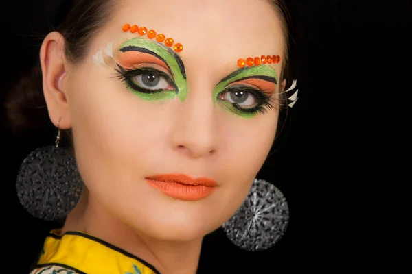 Lovely brunette woman portrait with creative make-up — Stock Photo, Image