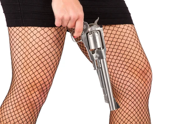 Legs of dangerous woman with handgun and black shoes — Stock Photo, Image