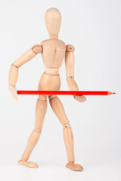 Small wood mannequin standing with colour pencil isolated on whi — Stock Photo, Image