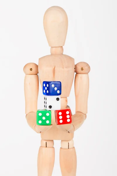 Wood mannequin holding colourful block dice isolated on white — Stock Photo, Image