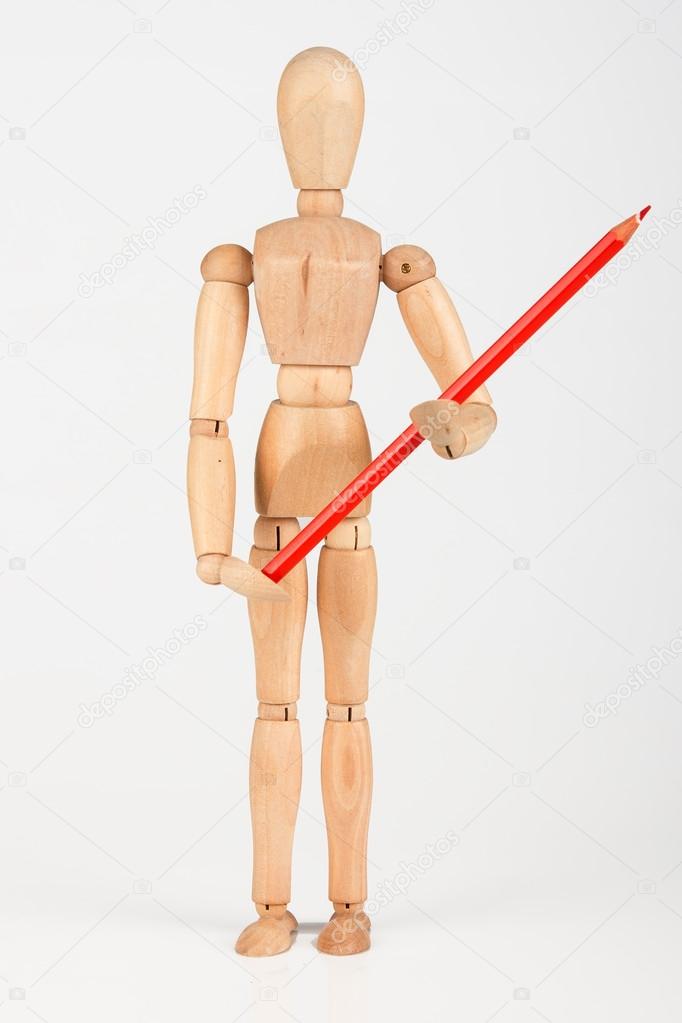 Small wood mannequin standing with colour pencil isolated on whi