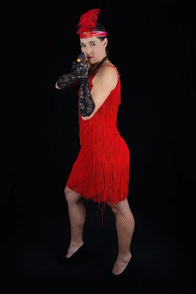 Dangerous beautiful brunette in 1920 style attire red dress feat — Stock Photo, Image