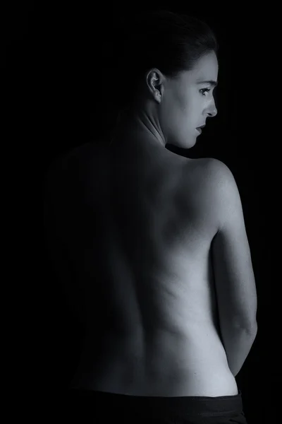 Paysage corporel de la femme en conversio artistique à faible émotion de lumière — Photo