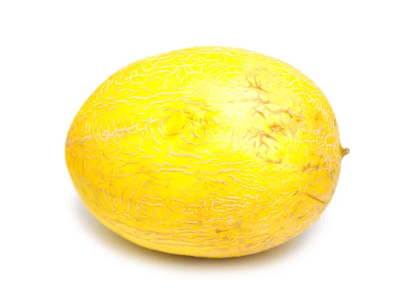 Melão amarelo sobre um fundo branco — Fotografia de Stock