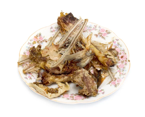 食品、魚や鶏皿の上からの骨の残渣 — ストック写真