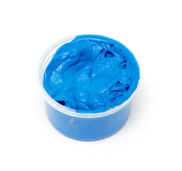 Blue oil paint in a plastic container — Stockfoto