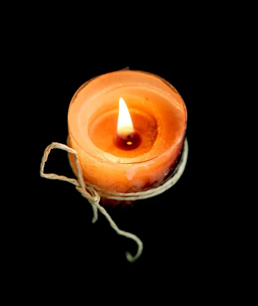 Flame of a candle on a black background — Stock Photo, Image