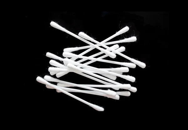 Cotton sticks isolated on black background — Stock Photo, Image