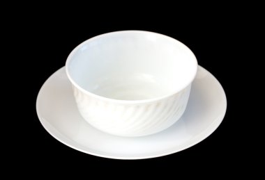 Beyaz fincan ve çay tabağı