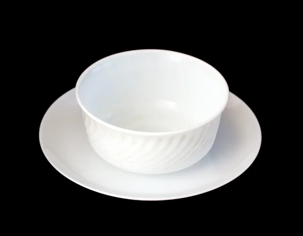 Белая чашка и блюдце — стоковое фото