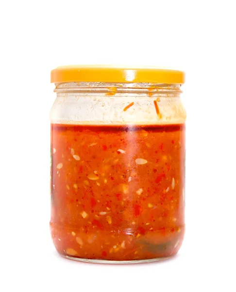 Glass jar with tomatoes — Stock Photo, Image