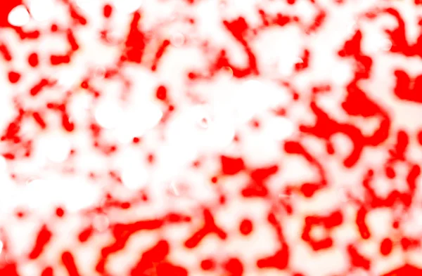 Manchas vermelhas em um fundo branco — Fotografia de Stock