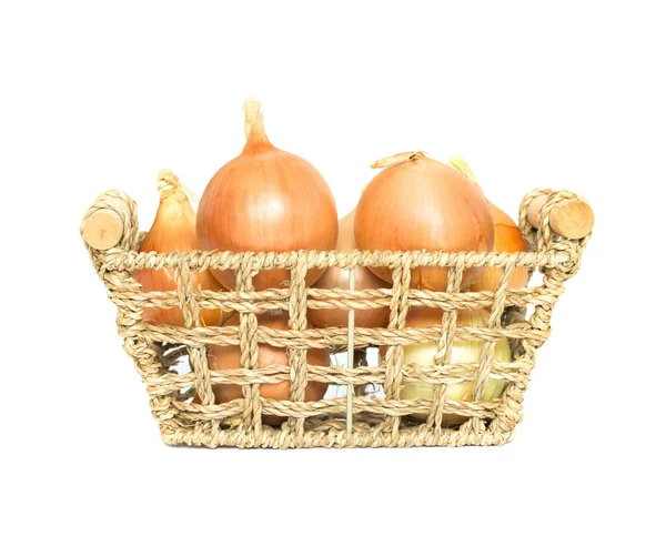 Pile of onions in basket — Stock Photo, Image