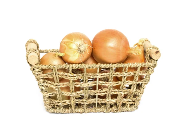 Pile of onions in basket — Stock Photo, Image