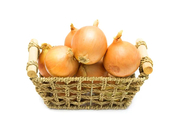 Pile of onions in basket — Stock Photo, Image