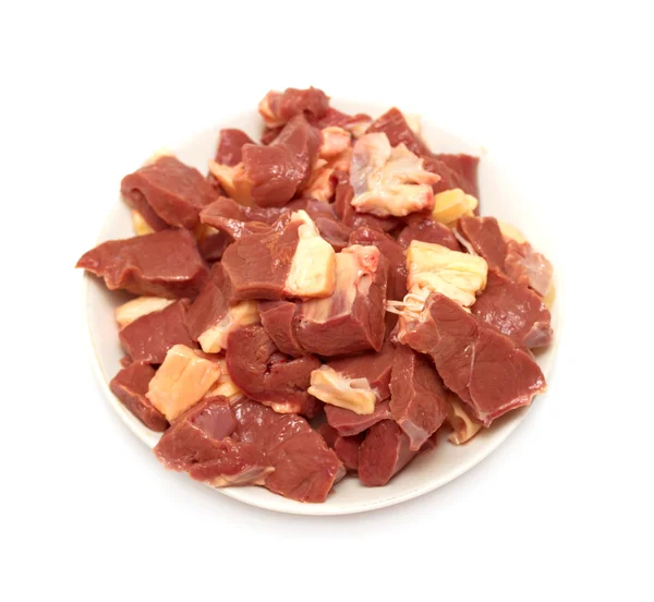 Kleine Fleischstücke auf einem Teller — Stockfoto