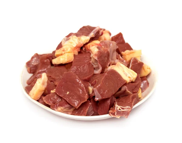 Piccoli pezzi di carne su un piatto — Foto Stock