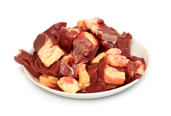 Small pieces of meat on a plate — Stock Photo, Image
