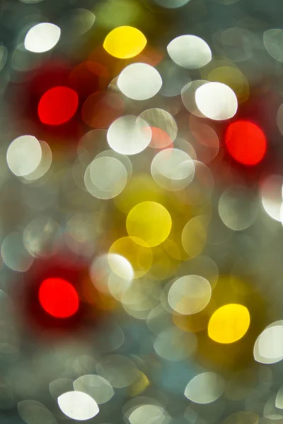 Vacaciones bokeh borrosa sobre un fondo oscuro — Foto de Stock