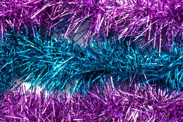 Blue and purple tinsel streamers — Stock Photo, Image