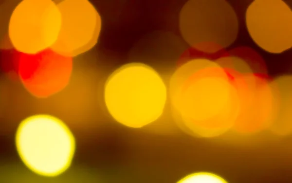 Holiday bokeh blurred on a dark background — Stock Photo, Image