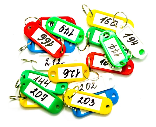 Alguns chaveiros e dígitos de cor — Fotografia de Stock