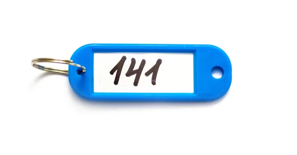 Porte-clés bleu avec chiffres — Photo