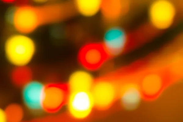 Holiday bokeh blurred on a dark background — Stock Photo, Image