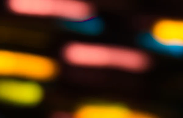 Holiday bokeh blurred on a dark background — Stock Photo, Image