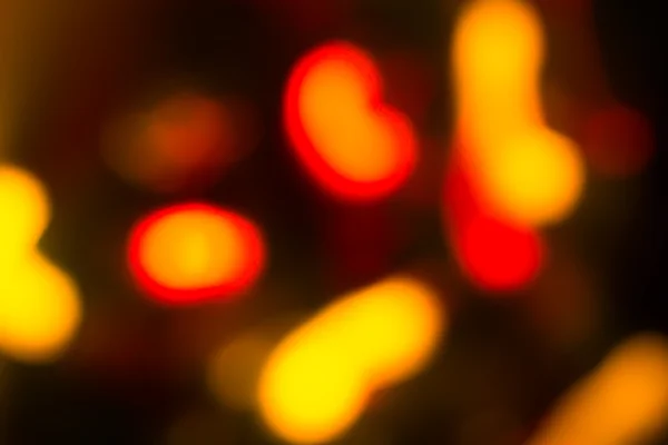 Holiday bokeh blurred on a dark background — Stock Photo, Image