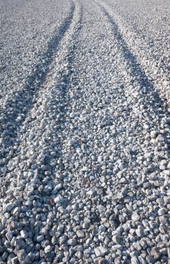 Yerde ezilmiş granit taşlar, arka plan dokusu.