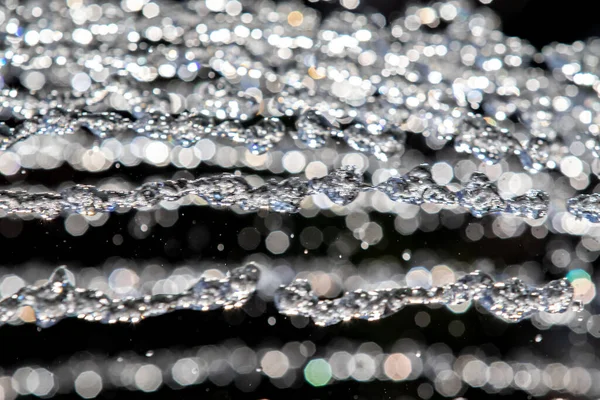 Water Droplets Air Fountain Defocused Bokeh Royalty Free Stock Photos