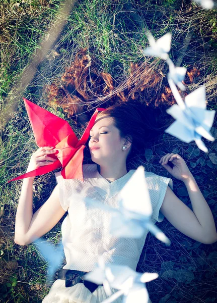 Girl with origami crane — Stock Photo, Image