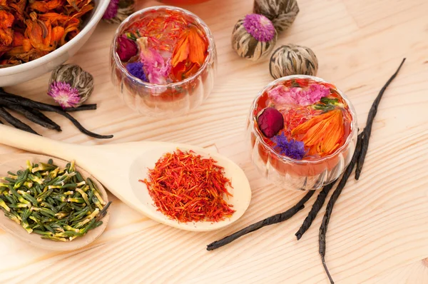 Herbal natural floral tea infusion with dry flowers — Stock Photo, Image