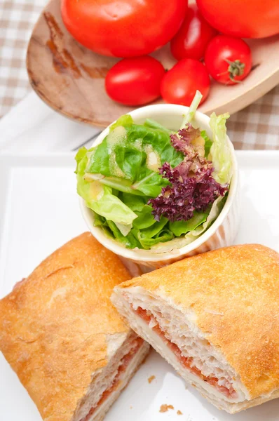 Ciabatta panini sandwich with parma ham and tomato — Stock Photo, Image