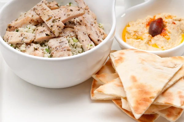 Chicken taboulii couscous with hummus — Stock Photo, Image