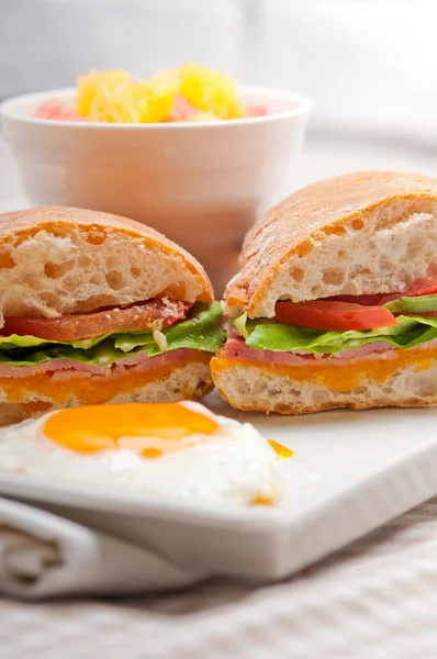 Ciabatta panini sandwich eggs tomato lettuce — Stock Photo, Image