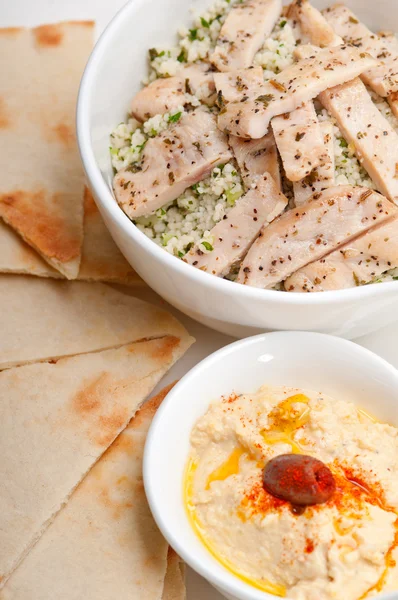 Chicken taboulii couscous with hummus — Stock Photo, Image